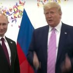 Putin e Trump sorridenti